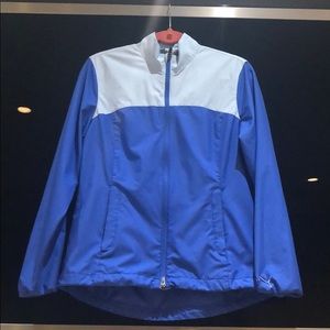 Puma light and dark blue rain jacket